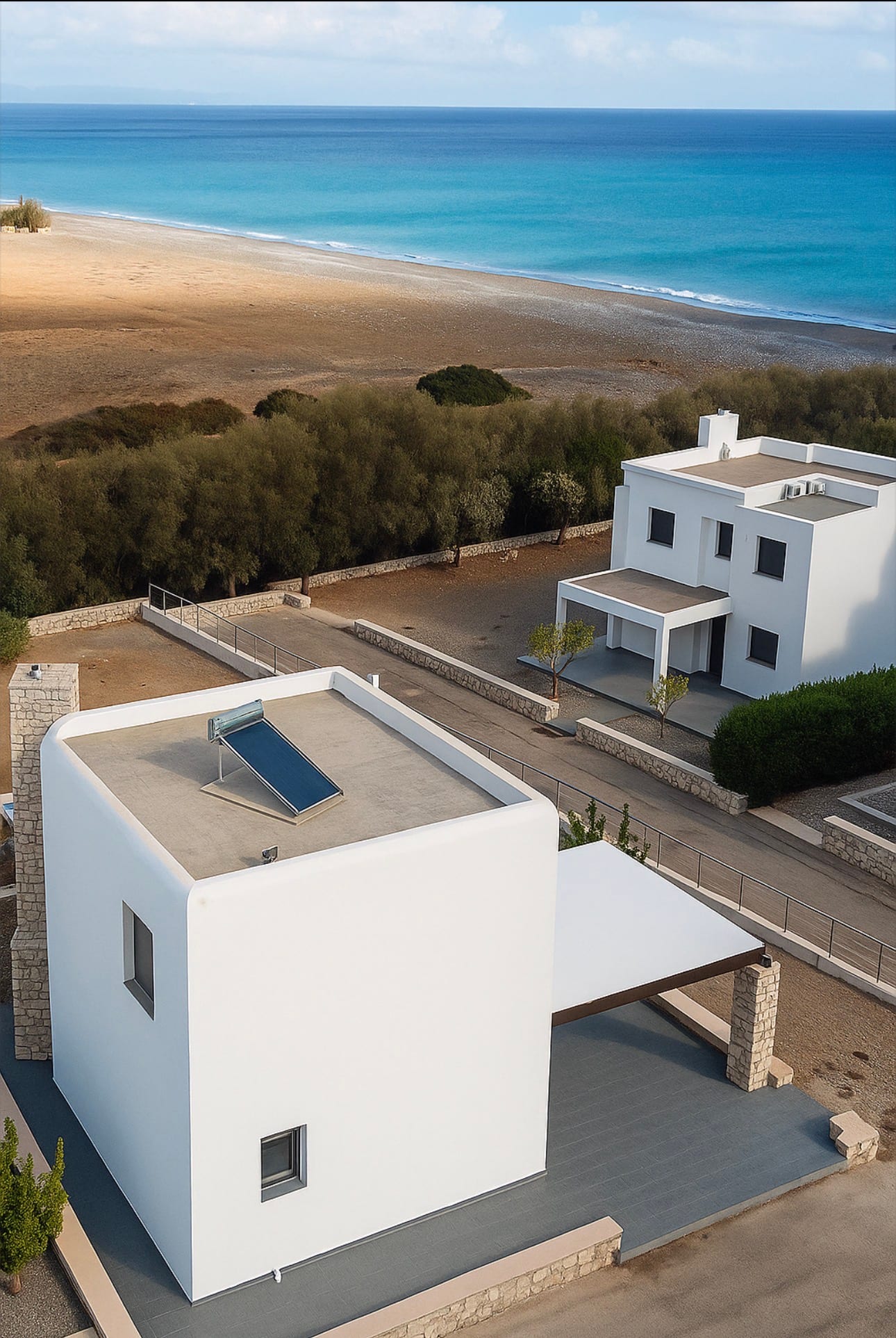 Villa Solmar seen from above, with Lachania beach and the Mediterranean beyond